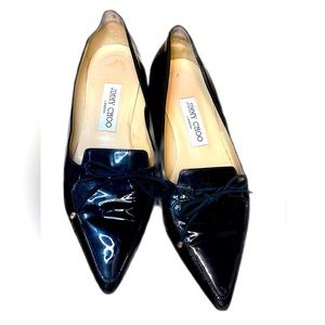 Black Jimmy Choo Patent Leather Loafers. Lace-Up Closure at Uppers.